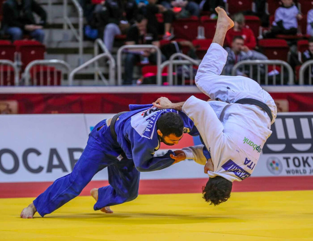 Judo in Action on olympic mat